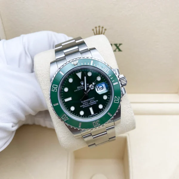 Rolex Silver with Green Dial